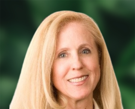 Maureen Dunn headshot over a green and black background.