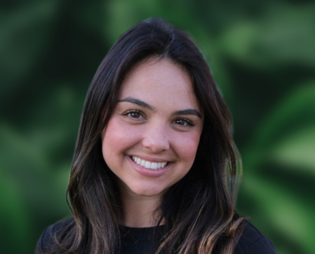 Haley Rosenblatt in front of a green and black background.